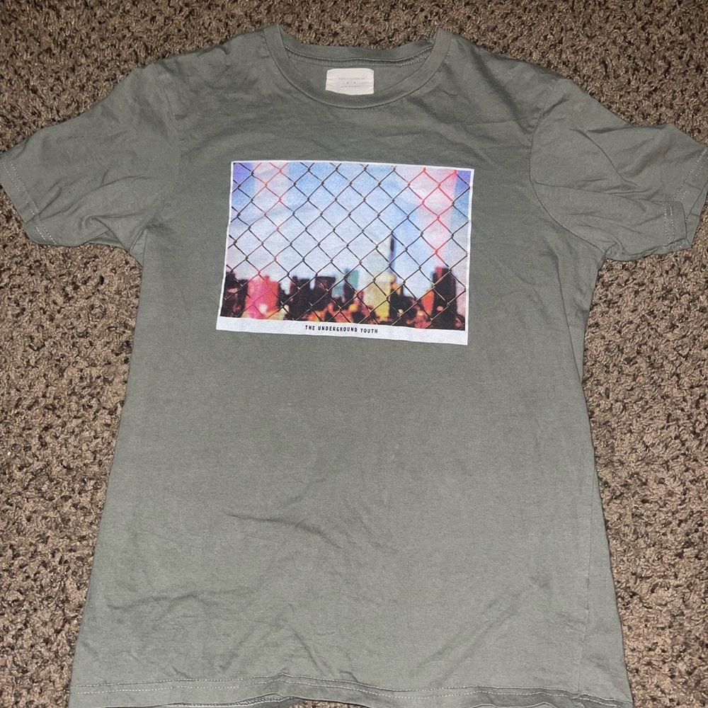 green graphic tee